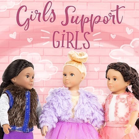 Three mini dolls with Girls Support Girls text.