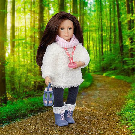 Hiking doll in forest.