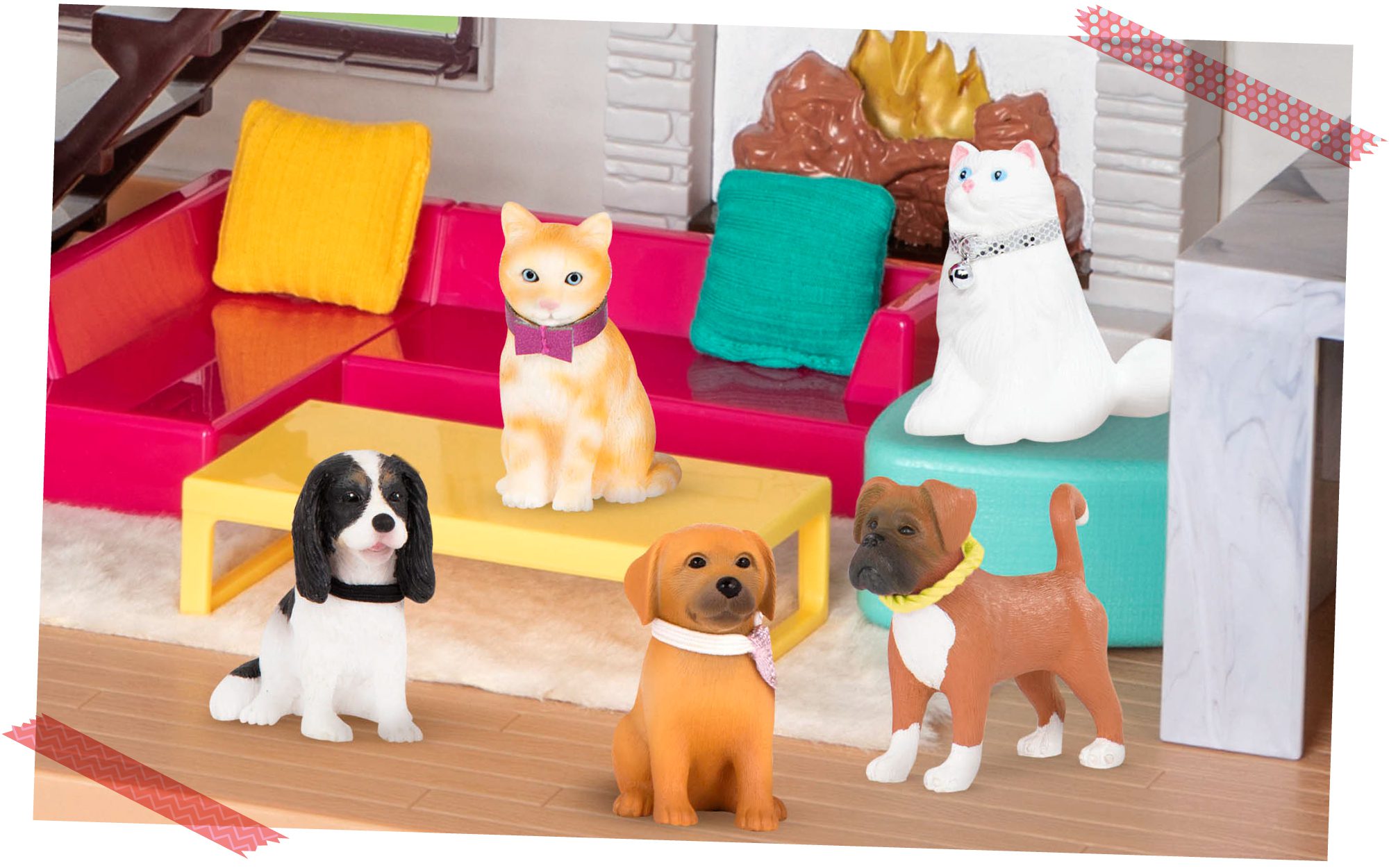Toy dog and cat figurines in a living room.