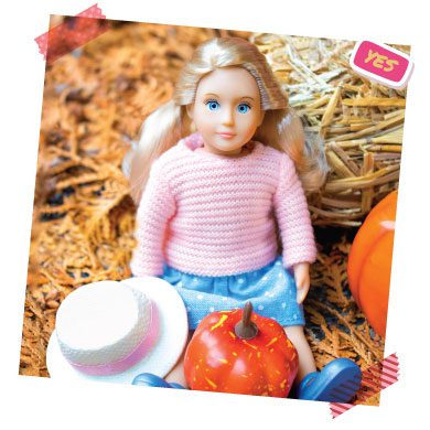 Doll with pumpkin.