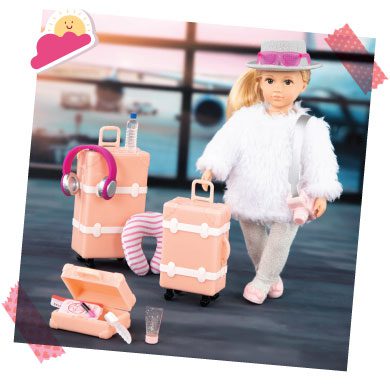 Doll with travel accessories.
