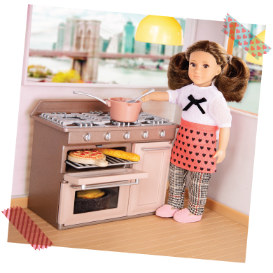 Mini doll with cooking accessories.